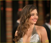 miranda-kerr-makes-sexy-entrance-with-plunging-neckline-at-vanity-fair-oscars-party-2014-06.jpg
