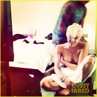 miley-cyrus-shares-topless-photo-01.jpg