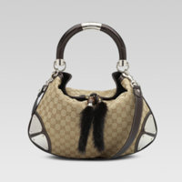 gucci mink tassel handbag.jpg