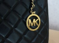 michael kors logo chain.jpg