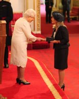 1415719923065_wps_11_Jane_Sutton_receives_the_.jpg