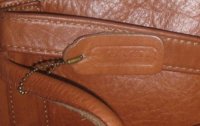hangtag_PROB-FAKE-hole+shape-lg.jpg