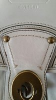 white hippie stitching around turnlock.jpg
