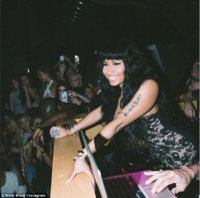 258202BE00000578-2945814-Late_night_Nicki_hit_the_DJ_booth_at_one_of_the_Grammys_pre_part-a-182_.jpg