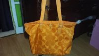 orange coach weekender.jpg