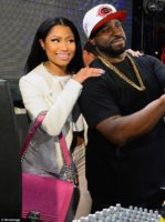 2844419D00000578-0-Quick_change_Nicki_swapped_her_turquoise_dress_for_an_abs_baring-m-157_143066.jpg