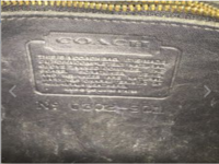 #3 well worn black leather coach bag.png
