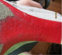 Louboutin Suede shoe logo.jpg