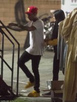 2D7BED4B00000578-3276562-Ready_for_cameras_Kylie_followed_her_beau_up_the_steps_into_what-m-3_14.jpg