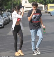 2D908DF000000578-3279805-Laid_back_Kendall_was_joined_by_a_male_friend_who_matched_her_ca-a-29_1.jpg