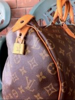 bag with lock and zipper pull.jpg