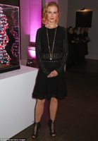2E9DAF9200000578-3326333-Understated_chic_Donning_a_black_semi_sheer_ribbed_top_which_fea-m-83_1.jpg
