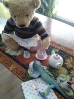 Bear studying lizard's manners.jpg