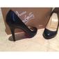 christian-louboutin-black-pumps-9711469-2-0.jpg