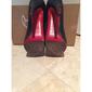christian-louboutin-black-pumps-9711469-6-0.jpg