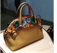 Outlaw bag with flowers.PNG