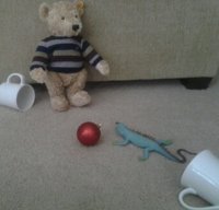 Bear playing kick-the-ornament.jpg