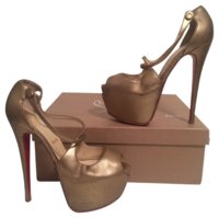 christian-louboutin-gold-pumps-1813857-0-0.jpg