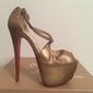 christian-louboutin-gold-pumps-1813857-4-0.jpg