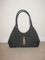 Gucci GG fabric piston lock small.jpg