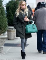 Ashley Benson, 26,  showed support for designer Marc Jacobs on Friday as she toted a green purse.jpg
