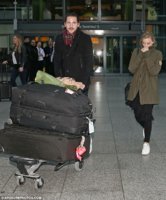 31D1BC1C00000578-3475347-Playing_the_doting_gentleman_Tom_wheeled_along_a_trolley_carryin-m-78_1.jpg