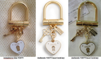 weindsteve fake vs authentic 93079 heart lock key fobs front.png