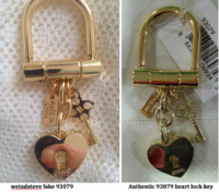 weindsteve fake vs authentic 93079 heart lock key fobs back.png