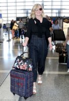 Kirsten Dunst was spotted all by her lonesome while arriving for a departing flight out of LAX A.jpg