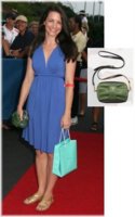 Kristin+Davis+and+Prada+Bow+clutch.JPG