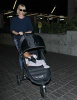 Charlize+Theron+Kids+Catch+Flight+Out+LAX+yN0UTven6kel.jpg