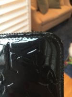 Zippy wallet peeling edges? Is this normal? Should I take it to a