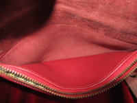 beautifulthings78-us red turnlock coach clutch behind zipper pocket.jpeg