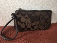 ttappalafox fake coach wristlet.jpeg
