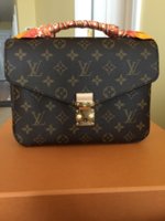 POCHETTE METIS ALL DRESSED UP.jpg