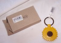 auth coach keychain and authentic brown box.jpg
