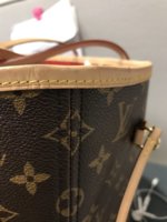 How can I clean this vachetta trim on my neverfull bag without