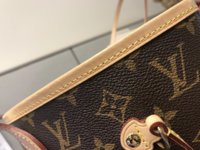 How can I clean this vachetta trim on my neverfull bag without