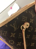 How can I clean this vachetta trim on my neverfull bag without