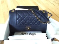 4 Blue Chanel Navy Sheepskin Mademoiselle Vintage Flap.jpg