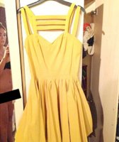 naked seller photoing prom dress.jpeg