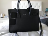 New bag with defective logo from Miami SL boutique.JPG