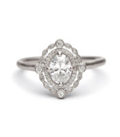 vintage-inspired-halo-diamond-platinum-engagement-ring_1.jpg