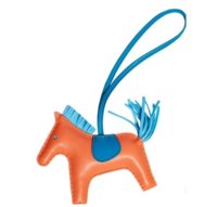 hermes-bag-charm-horse-front2_grande.jpeg
