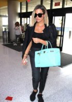 khloe-kardashian-departs-lax-in-los-angeles-06-04-2017-1_thumbnail.jpg