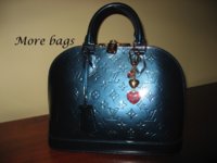 9_15 LV Leopard Heart Bag Charm on Bleu Nuit Alma Vernis PM.jpg