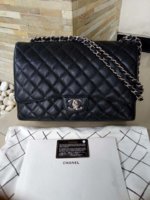Chanel Flap Maxi 1.jpg