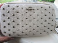 CoachCrossbodyRivetsPic.jpg
