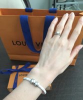 My first LV anything! My Partner did an excellent job picking it out!  Confidential Bracelet size 19. : r/Louisvuitton