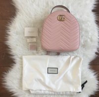 white gucci dust bag